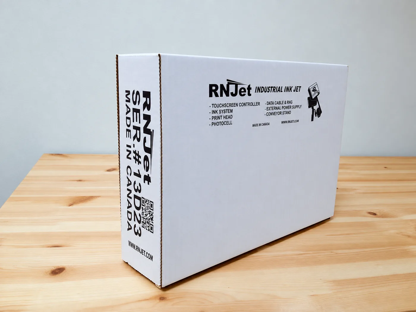 RNJet piezo printer code printed on a box
